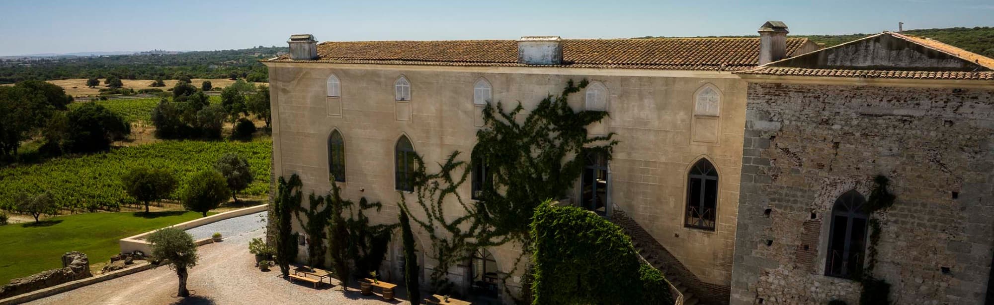 The medieval Paço do Morgado de Oliveira at Fita Preta among vineyards and cork oaks