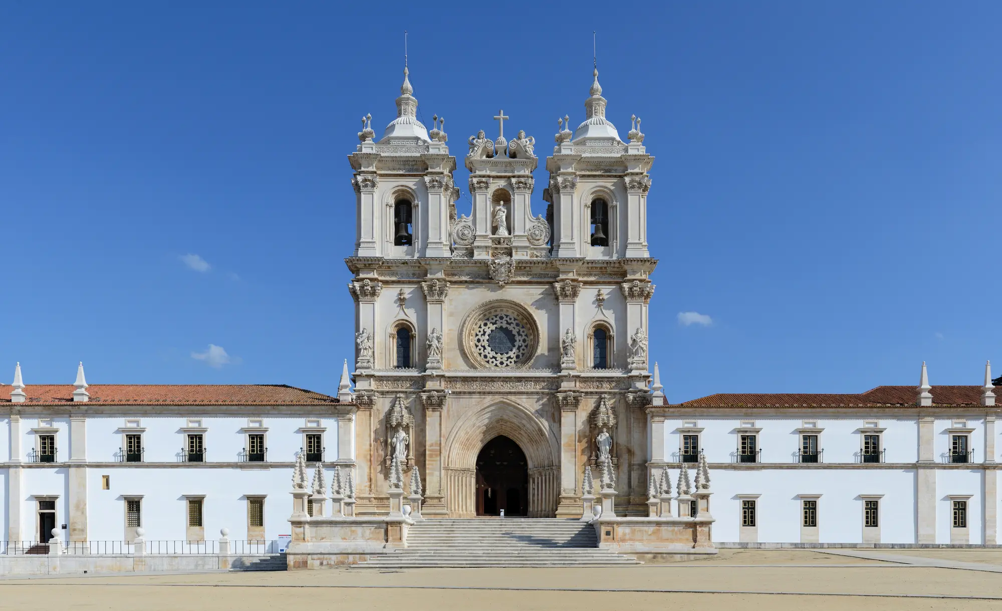 The broad baroque façade of Alcobaça Monastery