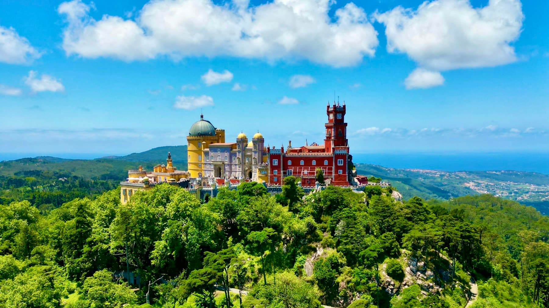 Pena Palace rising above the forested hills of Sintra
