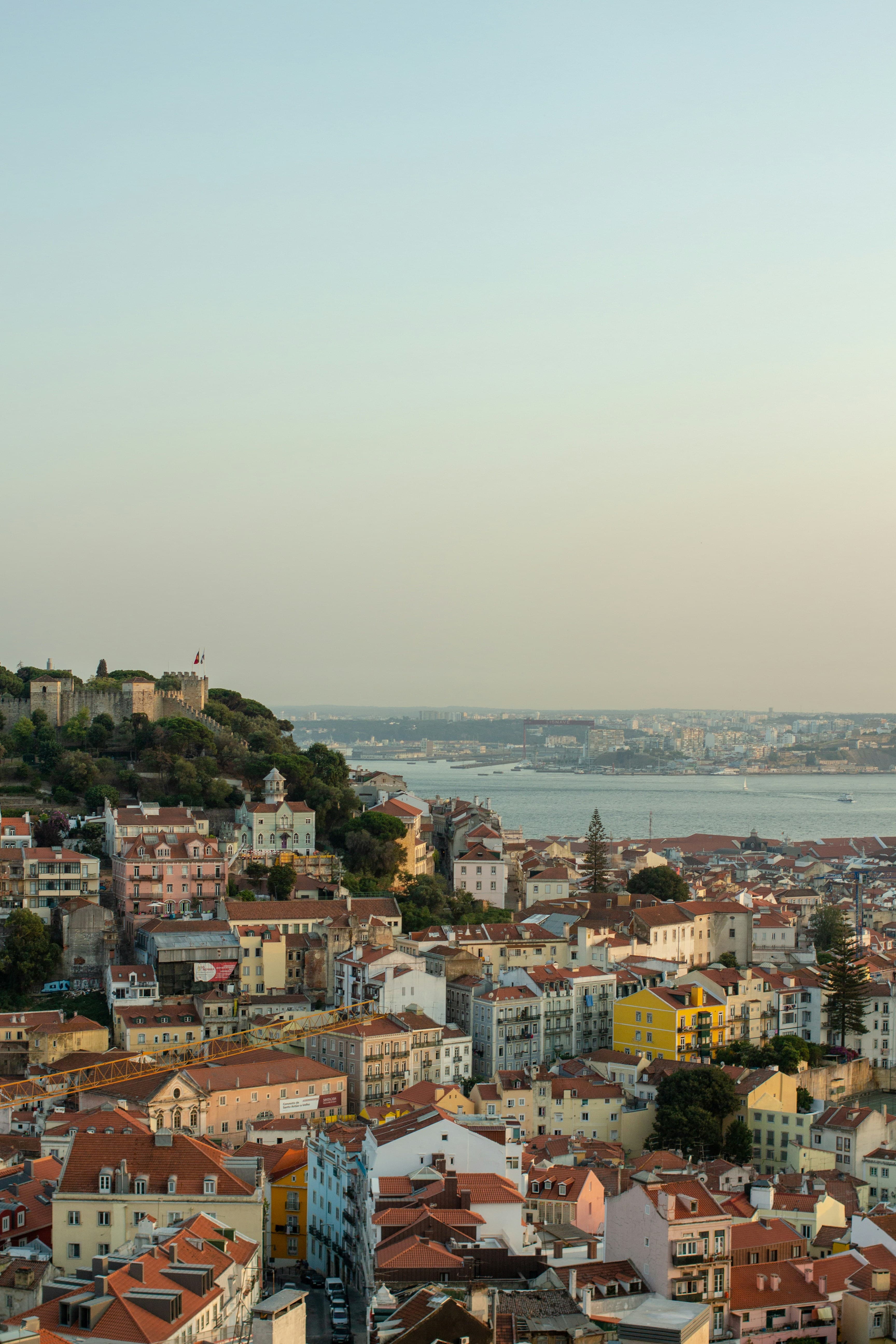An expansive aerial view of Lisbon’s central square and rooftops