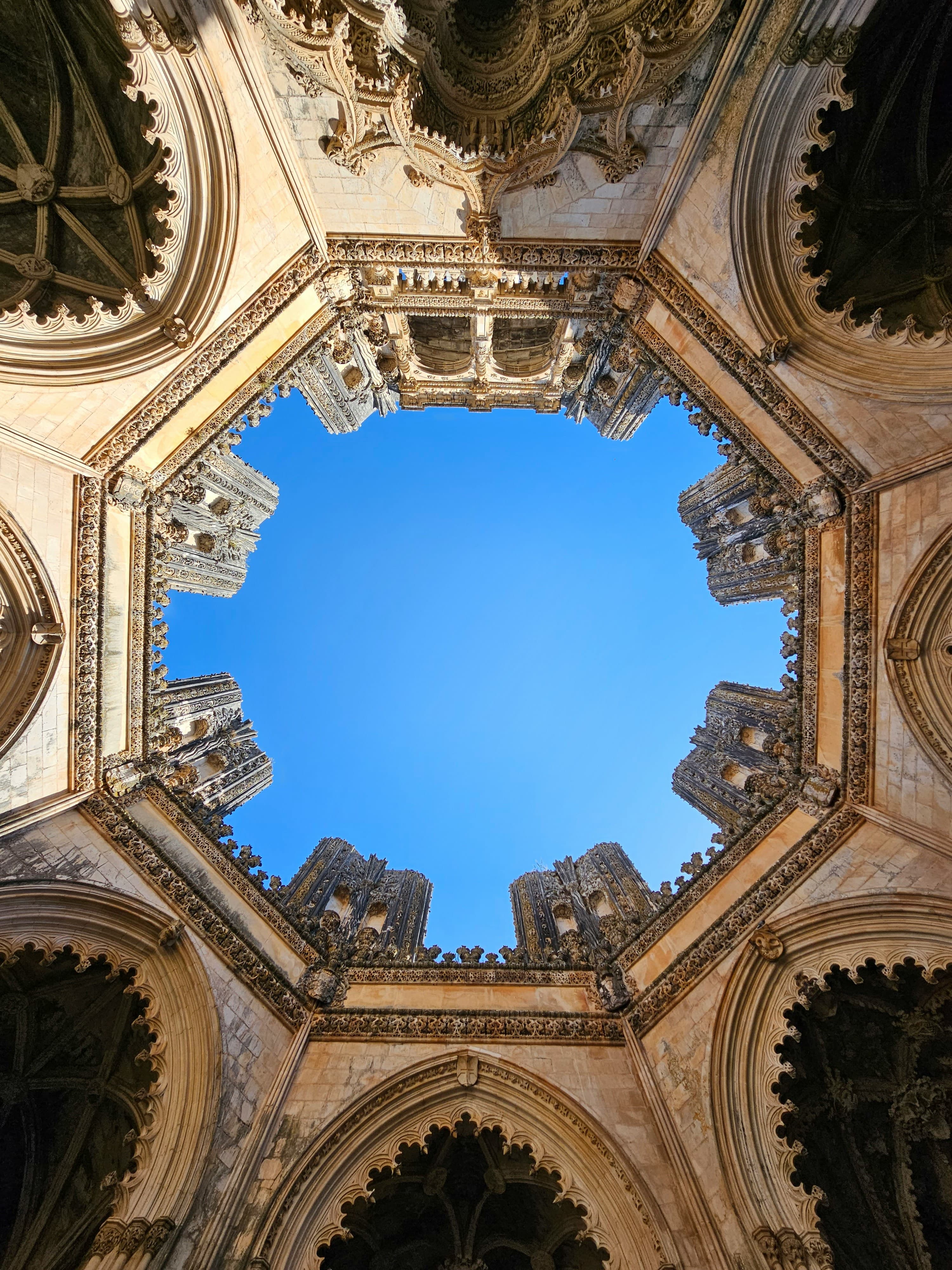 The Gothic Monastery of Batalha beneath a deep blue sky