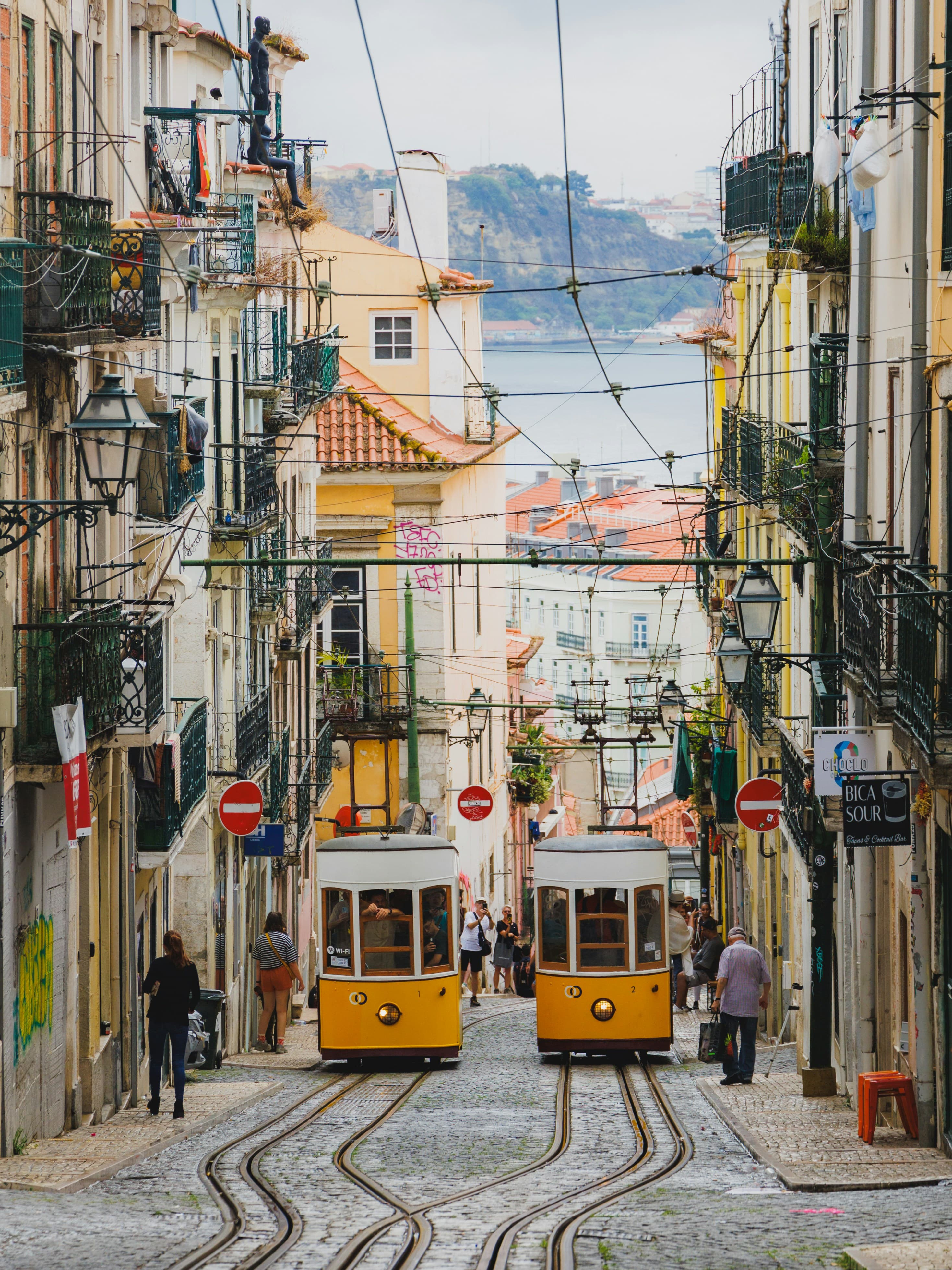 Lisbon’s historic tram route descending between colorful homes