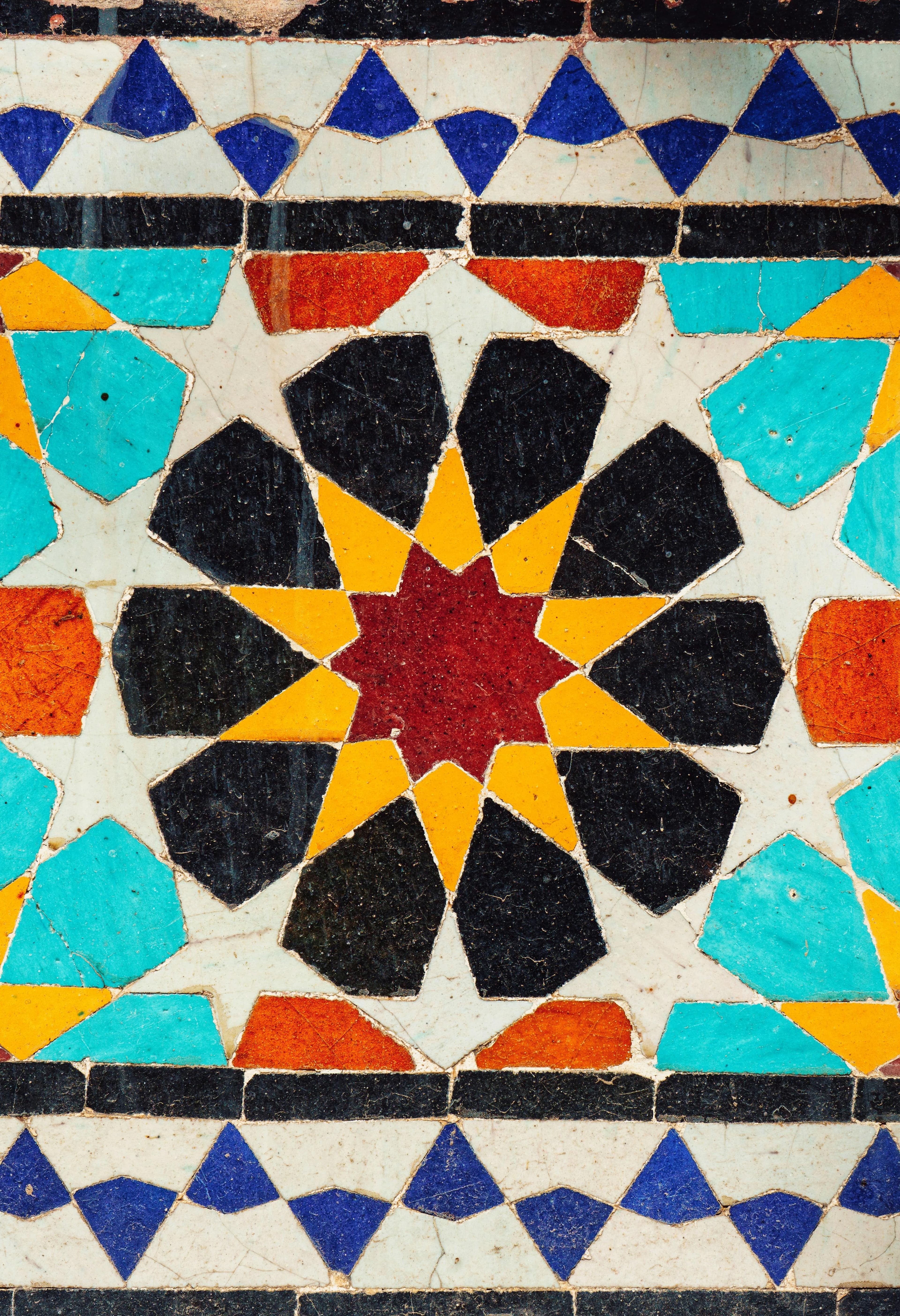 A bold yellow-and-blue geometric Portuguese tile pattern
