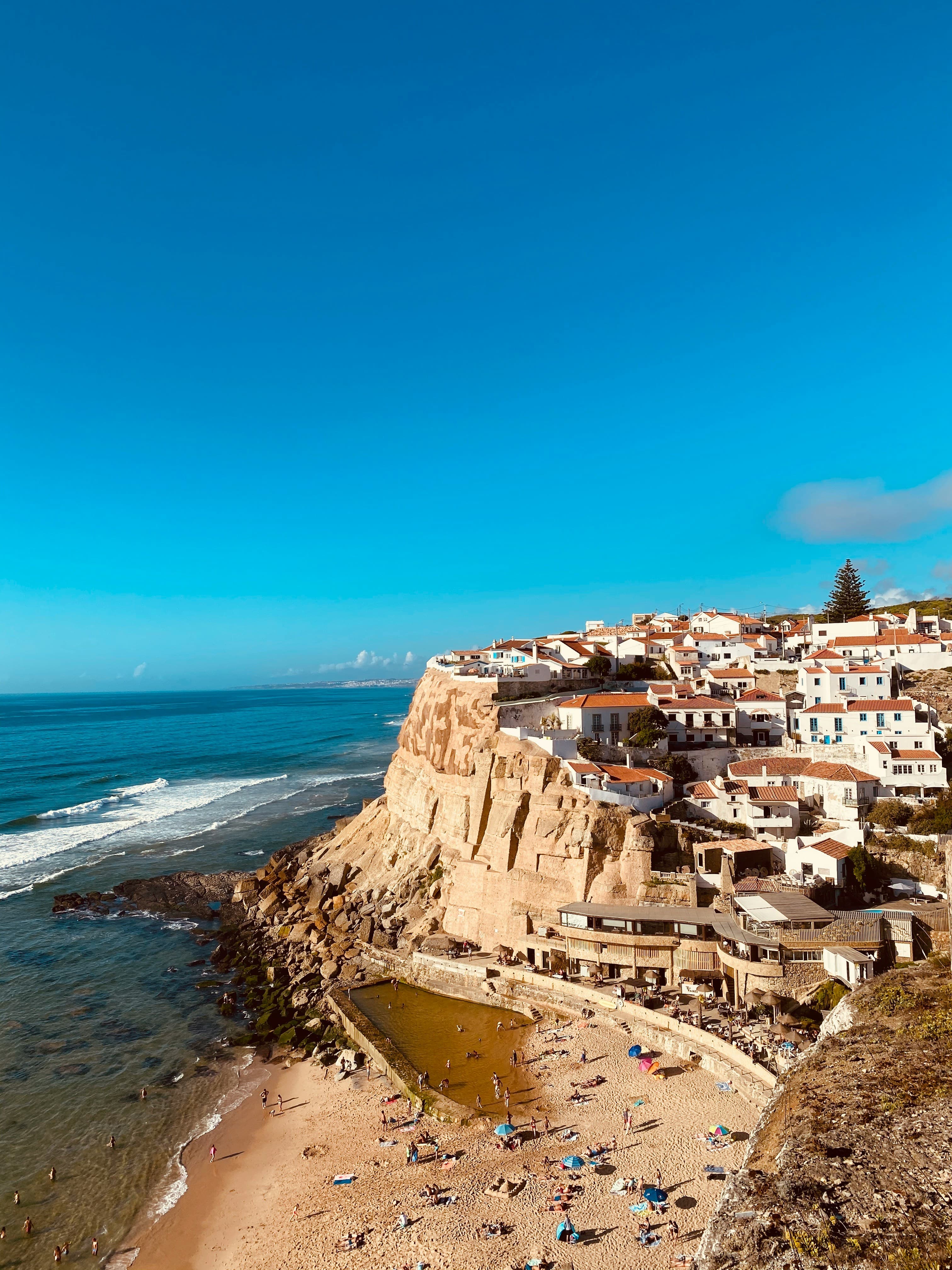 A coastal Portuguese village above a sandy beach