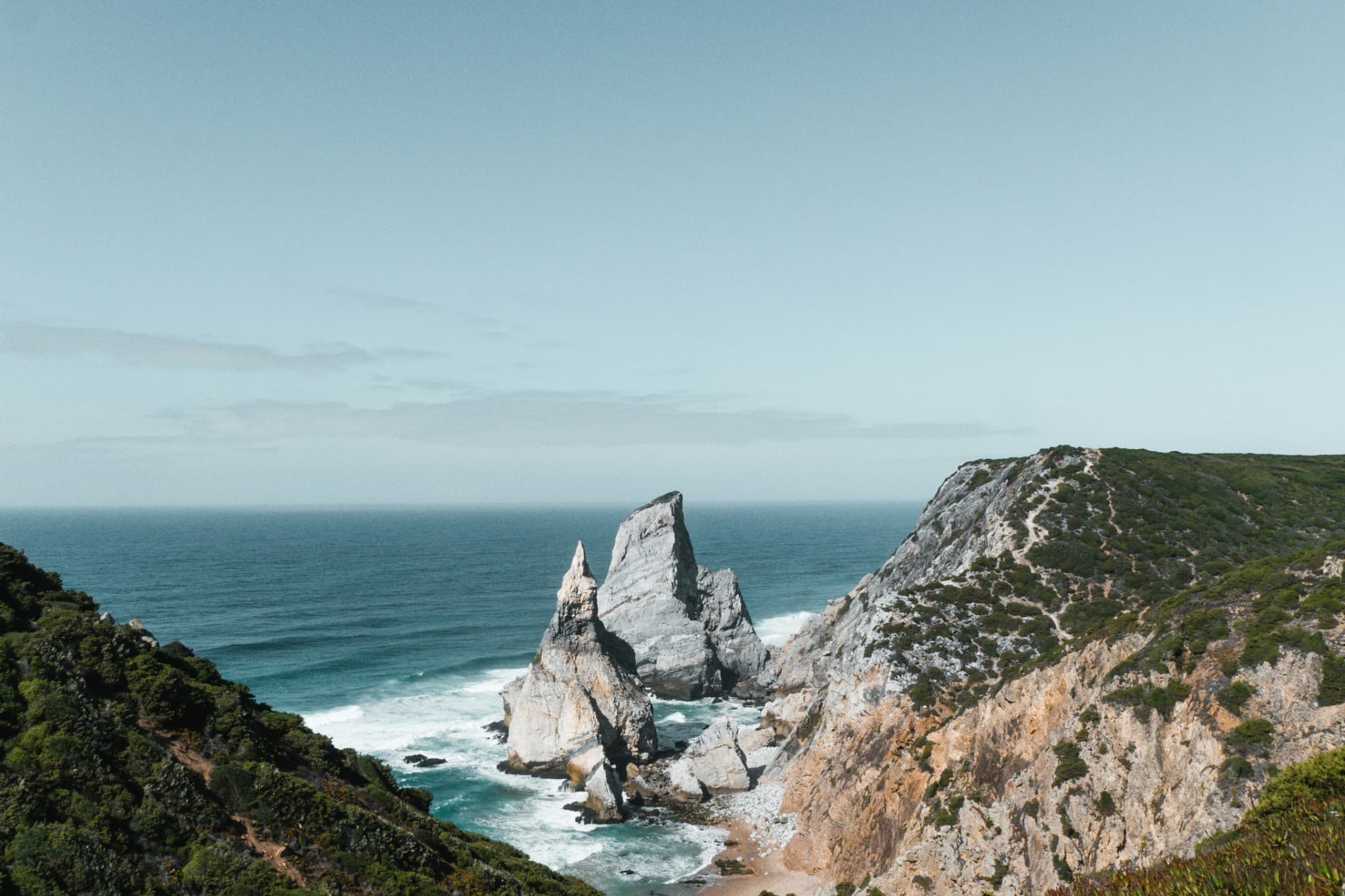 Towering sea stacks and cliffs above Praia da Ursa near Cabo da Roca